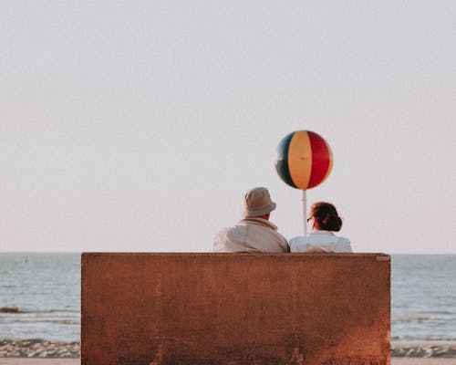 Elderly couple at seaside in summer