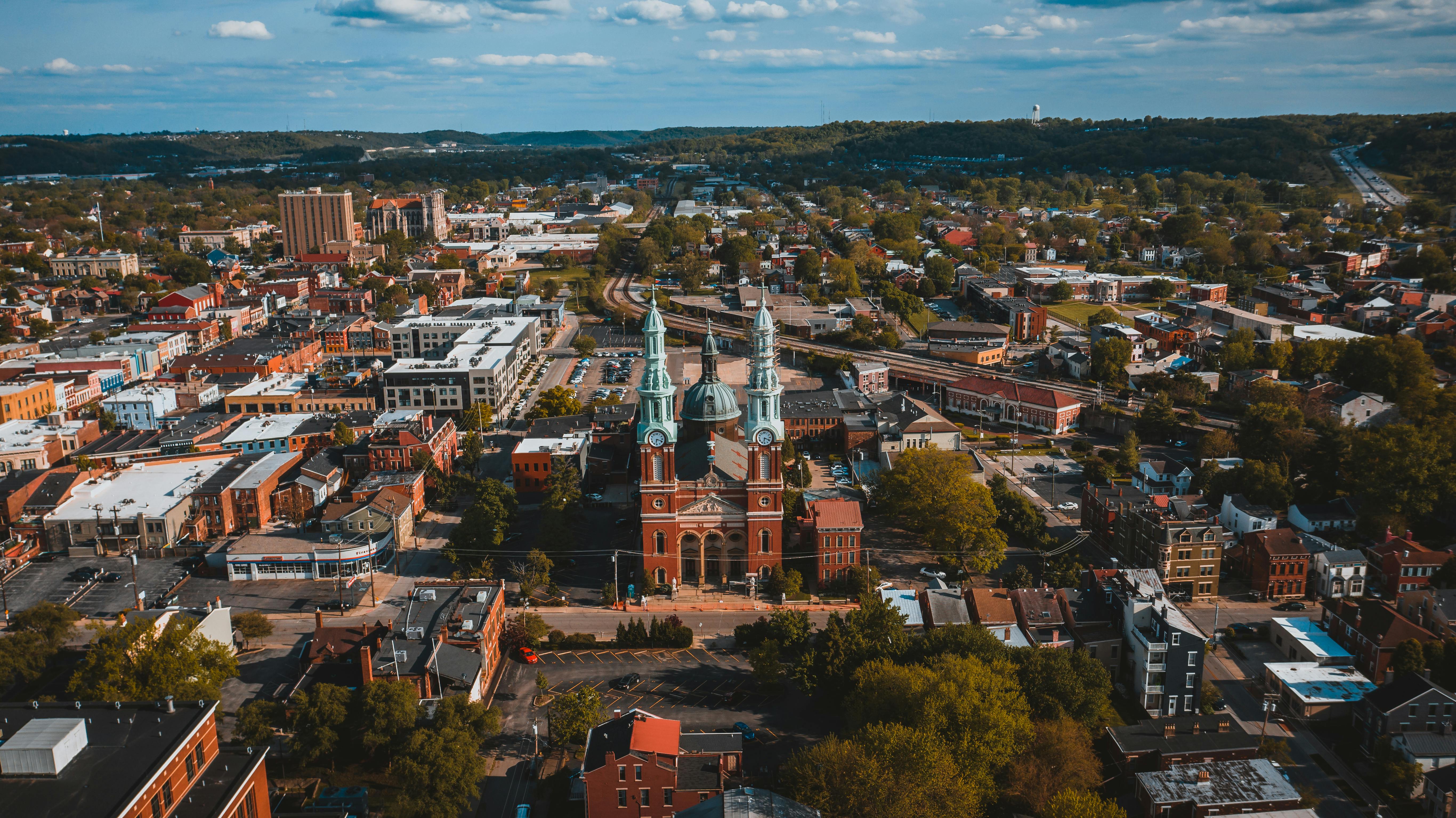 A red brick church with twin spires anchors this small Southern town, reflecting the tight-knit communities where cultural habits shape health outcomes.