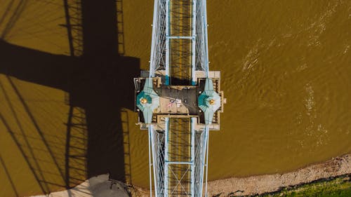 Free Blue metallic bridge over river Stock Photo