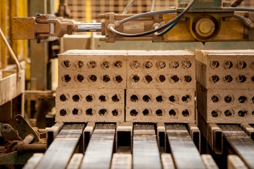 Brown Wooden Blocks on a Machinery