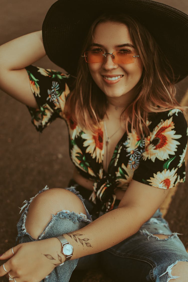 Crop Smiling Stylish Tattooed Woman In Accessories And Hat