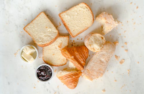 Free Assorted Bread on a Marble surface Stock Photo