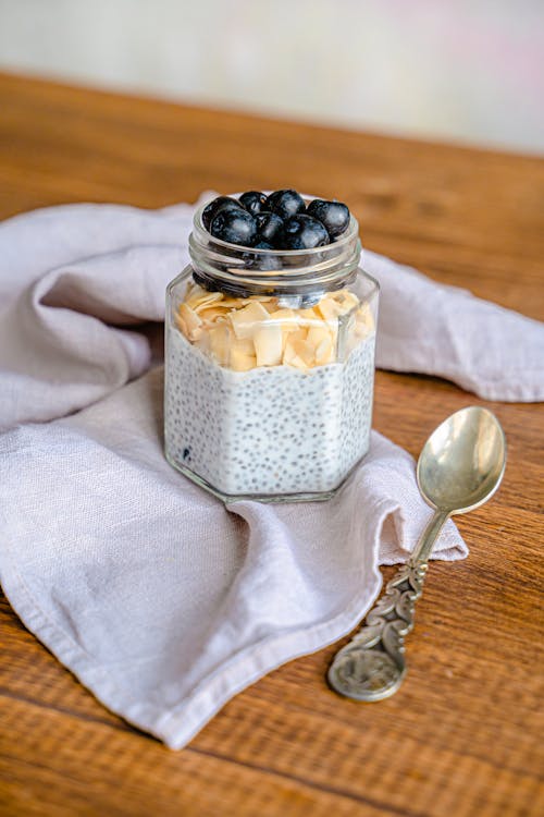 Spoon and Jar of Delicious Fruit Snack 