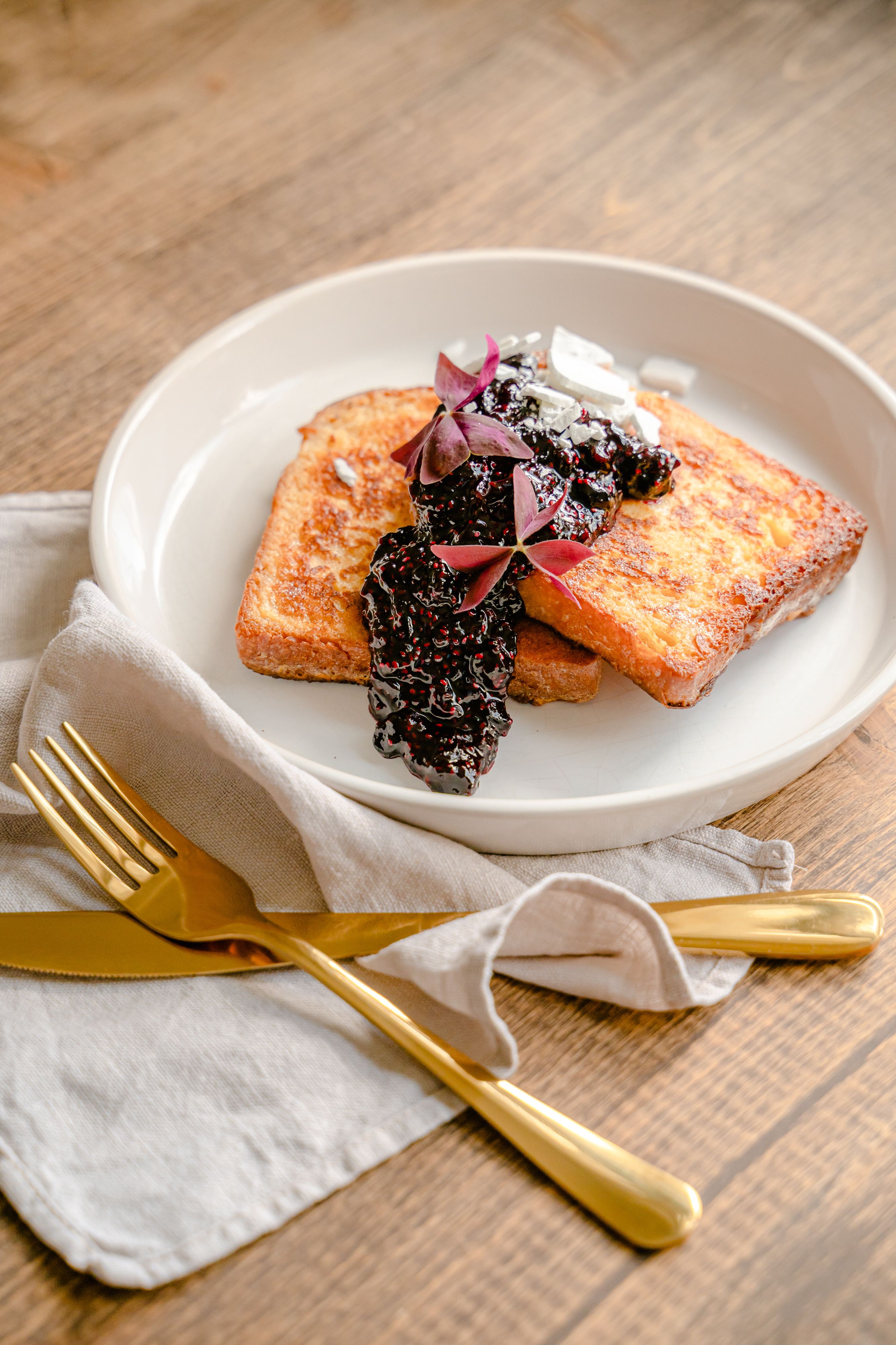 Prepared French toast showing the custardy bread texture.