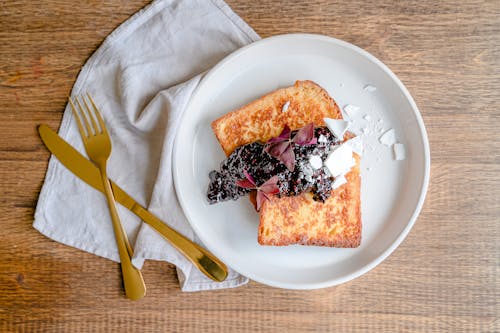 Free Toasted Bread with Jam on a Plate Stock Photo