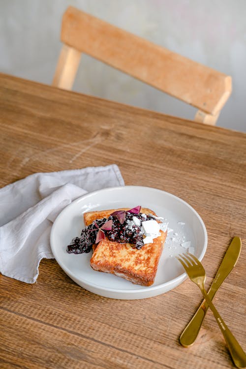 Free Golden Fork and Knife by Plate with Waffles Stock Photo