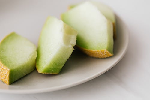 Slices of melon placed in plate