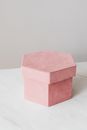 Creative pink present box on marble table
