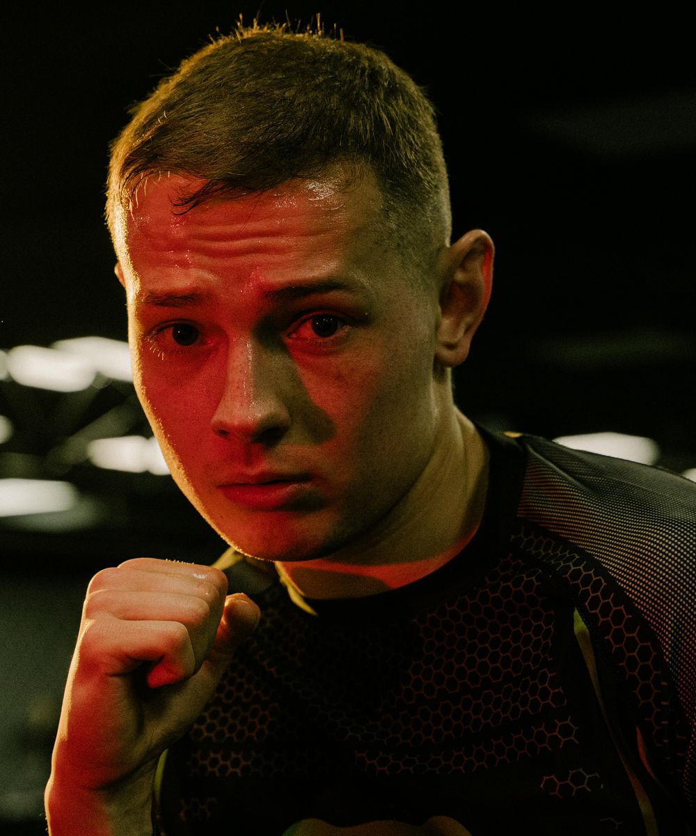 Focused male boxer in a gym
