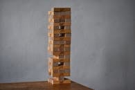 Party game with wooden blocks placed on top of each other as tower for playing