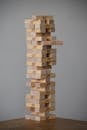 Tower of wooden blocks stacked on top of each other upwards for playing desktop game