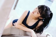 A Woman in Blue Swimwear