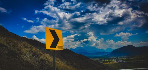 Free stock photo of clouds, dynamic, roadsign Stock Photo