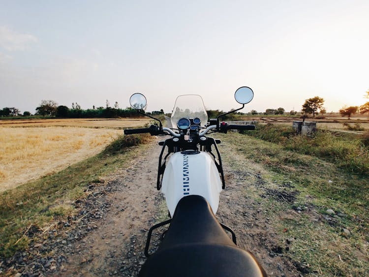 Motorcycle Parked On Rural Road