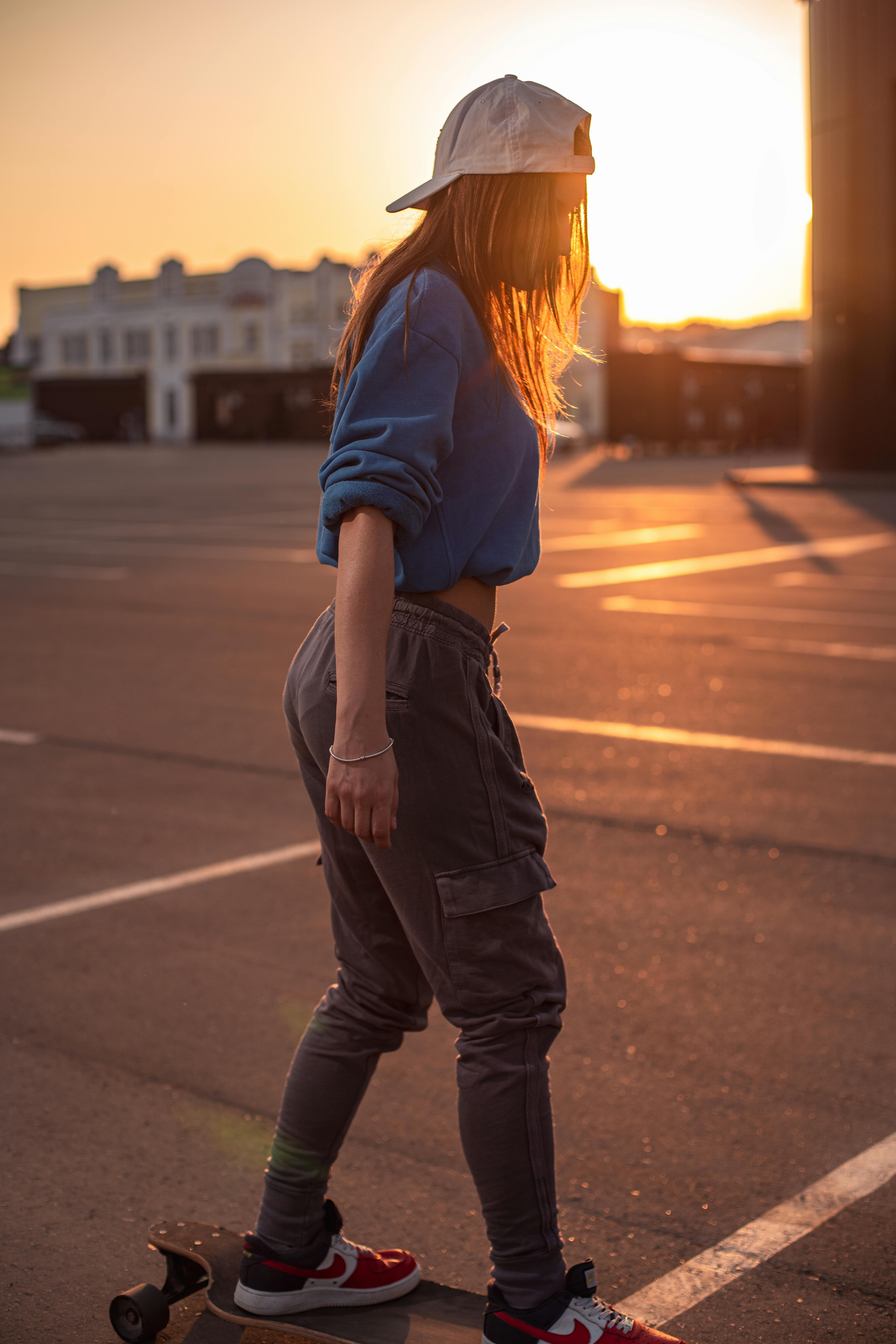 Unrecognizable Male Skating In Street In Daytime Free Stock Photo