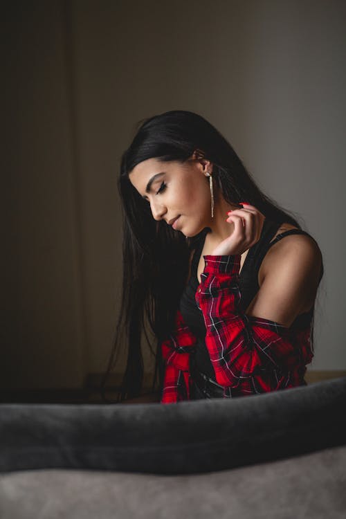 Woman in Red and Black Plaid Shirt