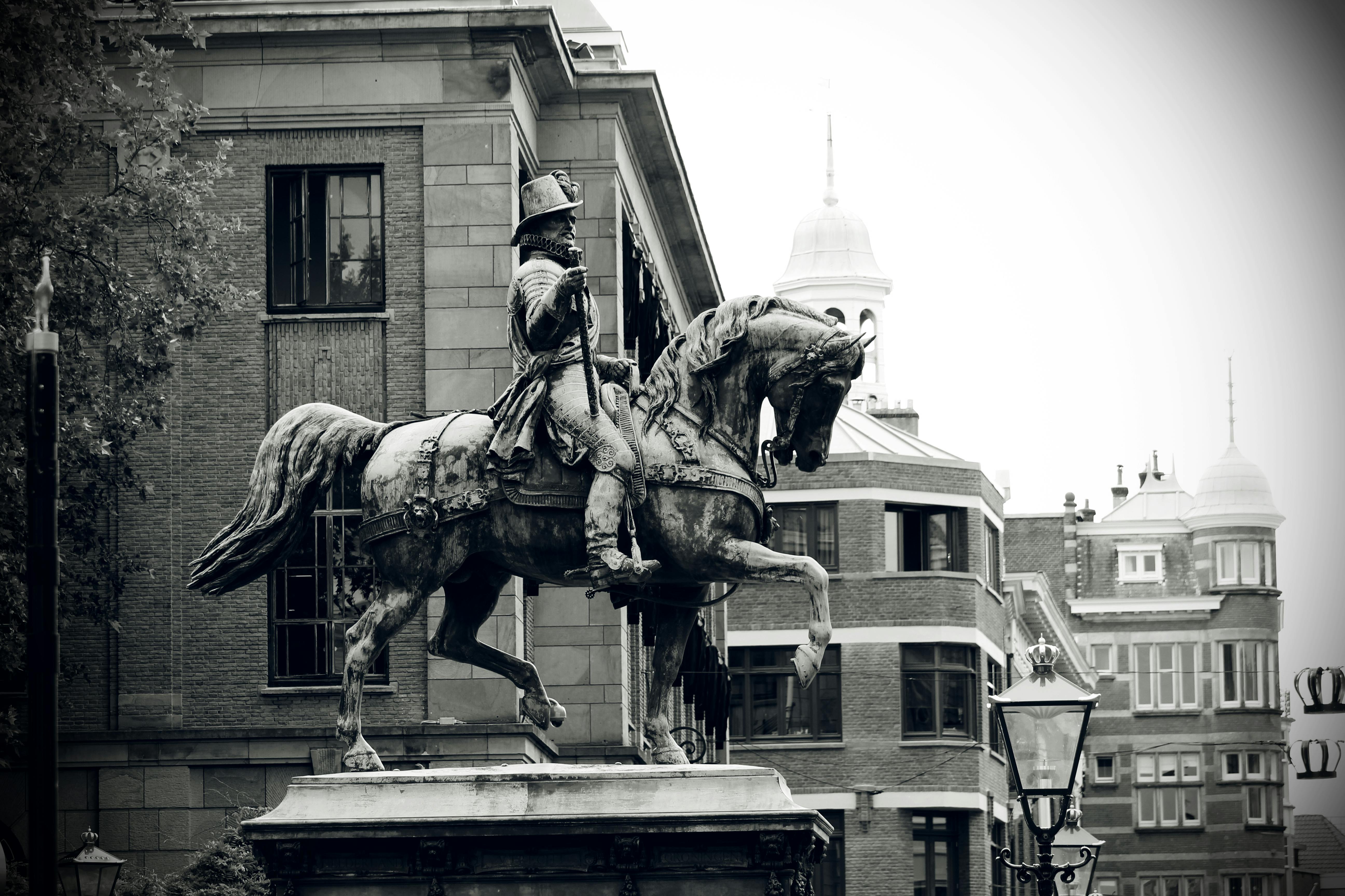 Grayscale Photography of Man Riding Horse Statue · Free ...