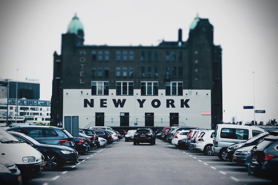 New York Hotel Building at Parking Lot · Free Stock Photo