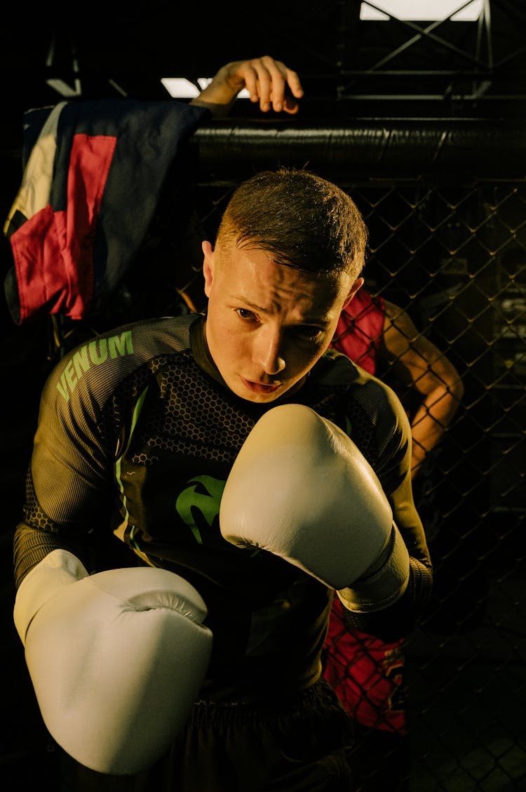 A Man Training Inside A Fight Ring