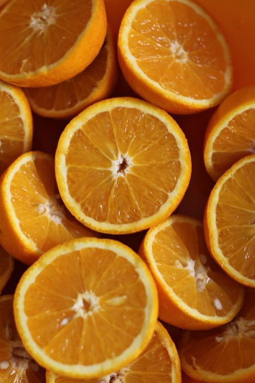 Free Close-up of fresh orange slices showing vibrant color and texture. Stock Photo