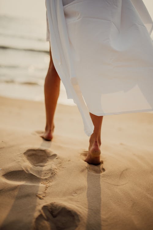 Free Foot Prints in the Sand Stock Photo
