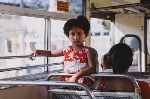 Free A Girn Inside a Bus Stock Photo