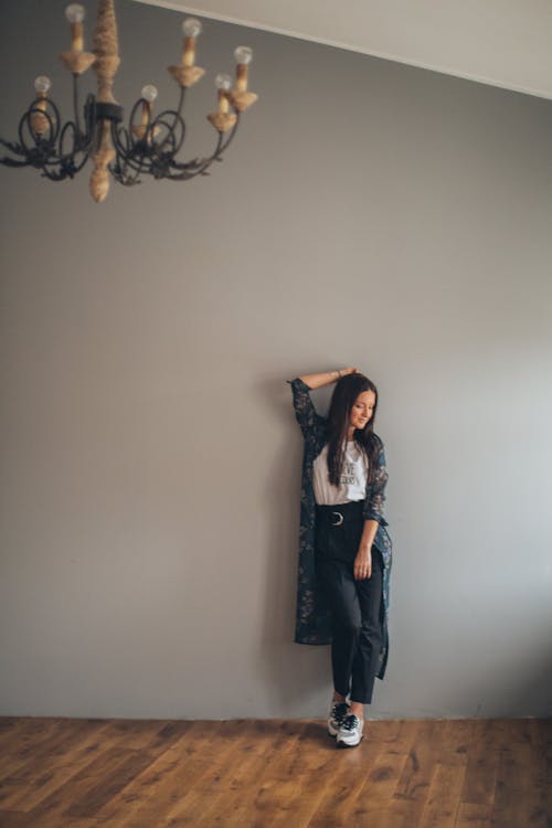 A Woman With Floral Shrug over Her Casual Wear 