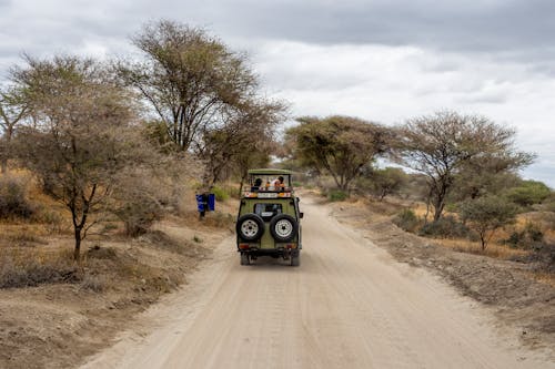 A Safari Jeep on Dirt Road