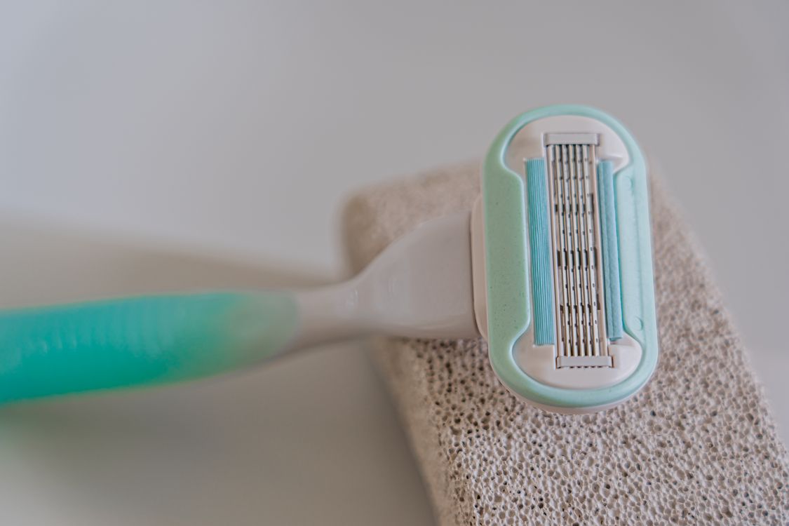 A Disposable Shaving Razor in Macro Photography · Free Stock Photo
