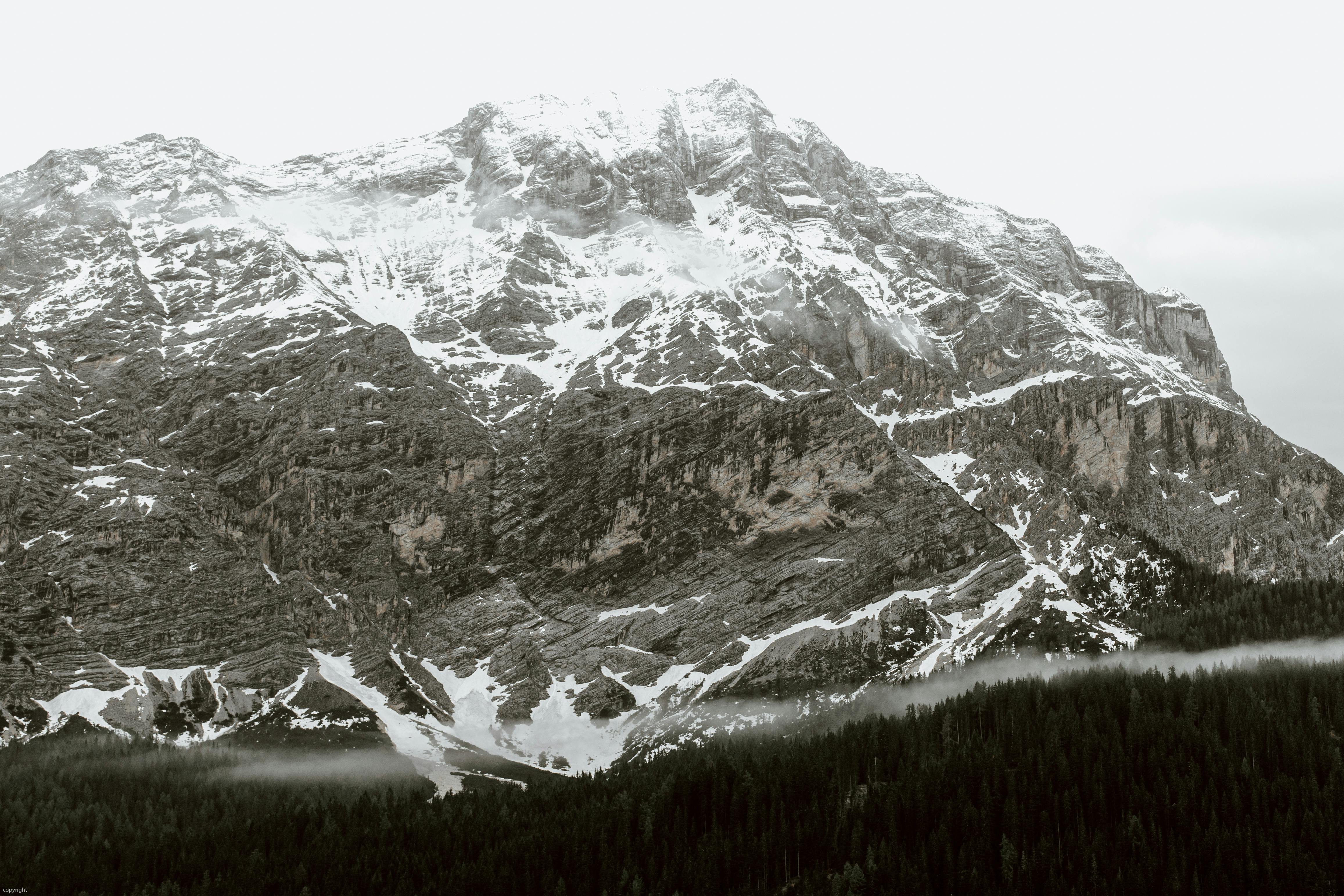 Snowy Rocky Mountain In Wild Valley On Foggy Winter Day Free Stock Photo