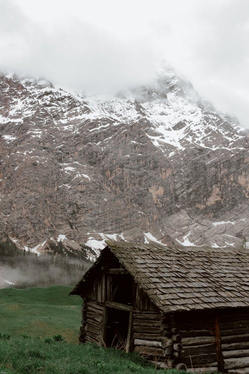 Old deserted house near mountain