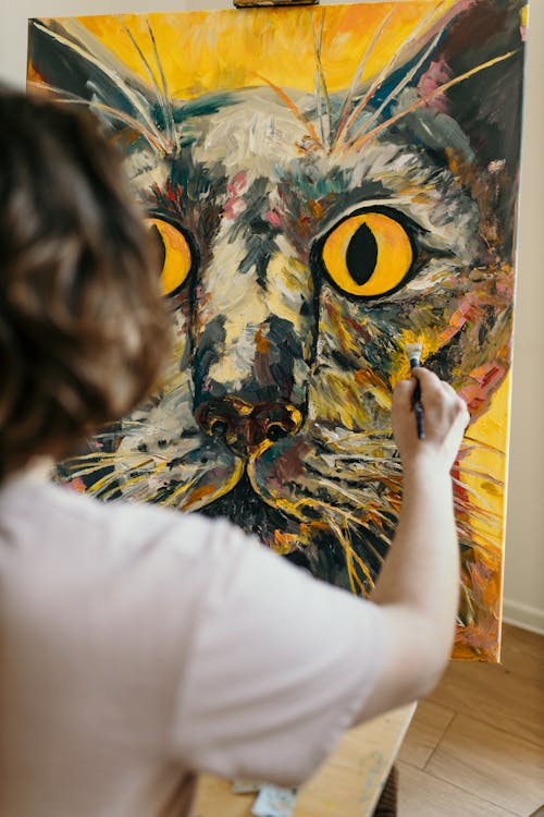 Free Person in White T-shirt With Owl Painting Stock Photo
