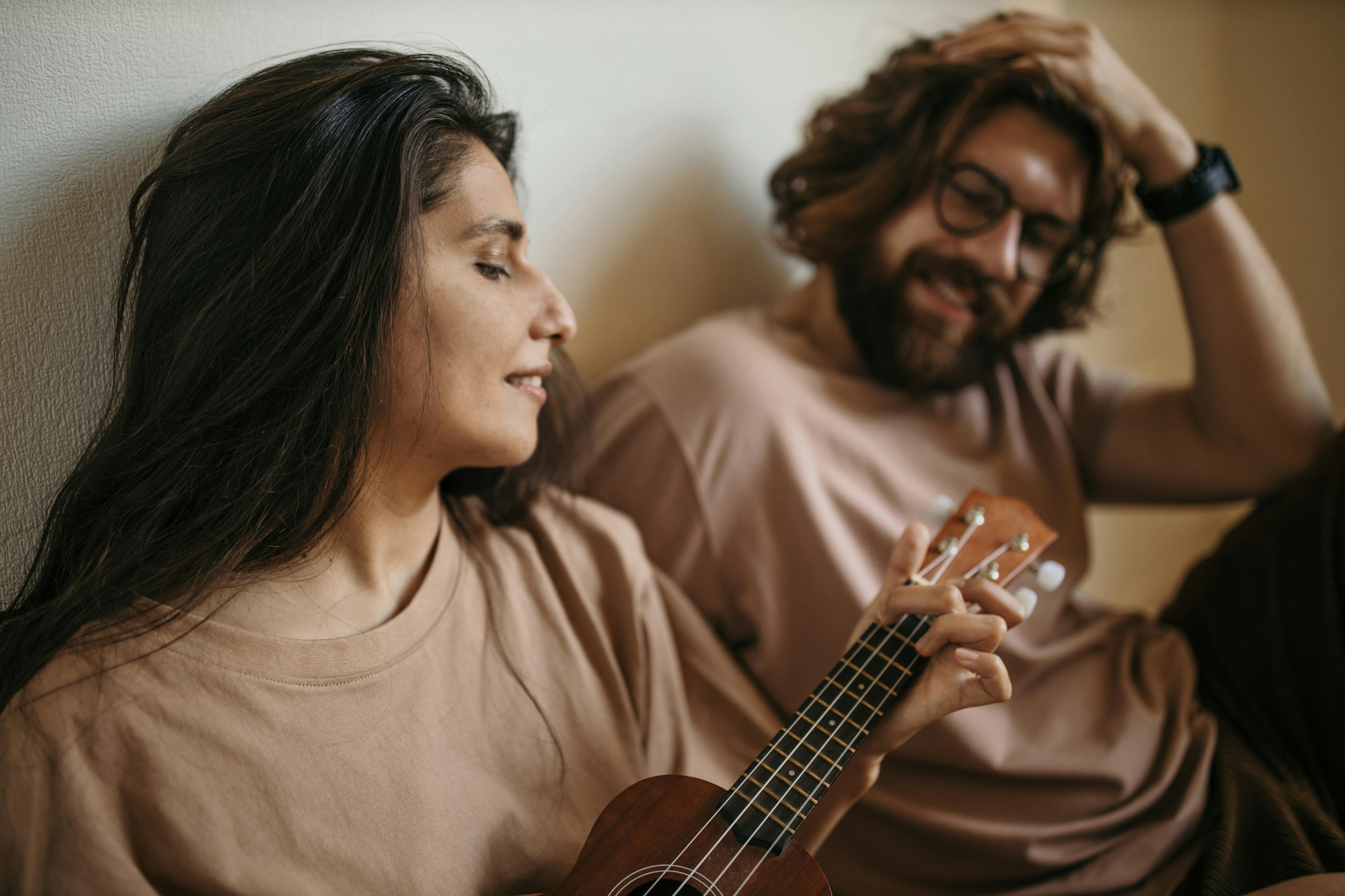 Man in Brown Crew Neck Shirt Beside Woman in Brown Crew Neck Shirt