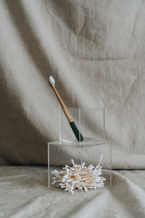 Photo Of Cotton Buds And Toothbrush 