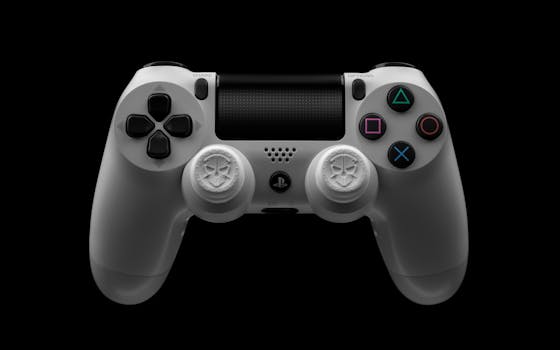 Close-up of a white PS4 controller on a black background, highlighting gaming design.