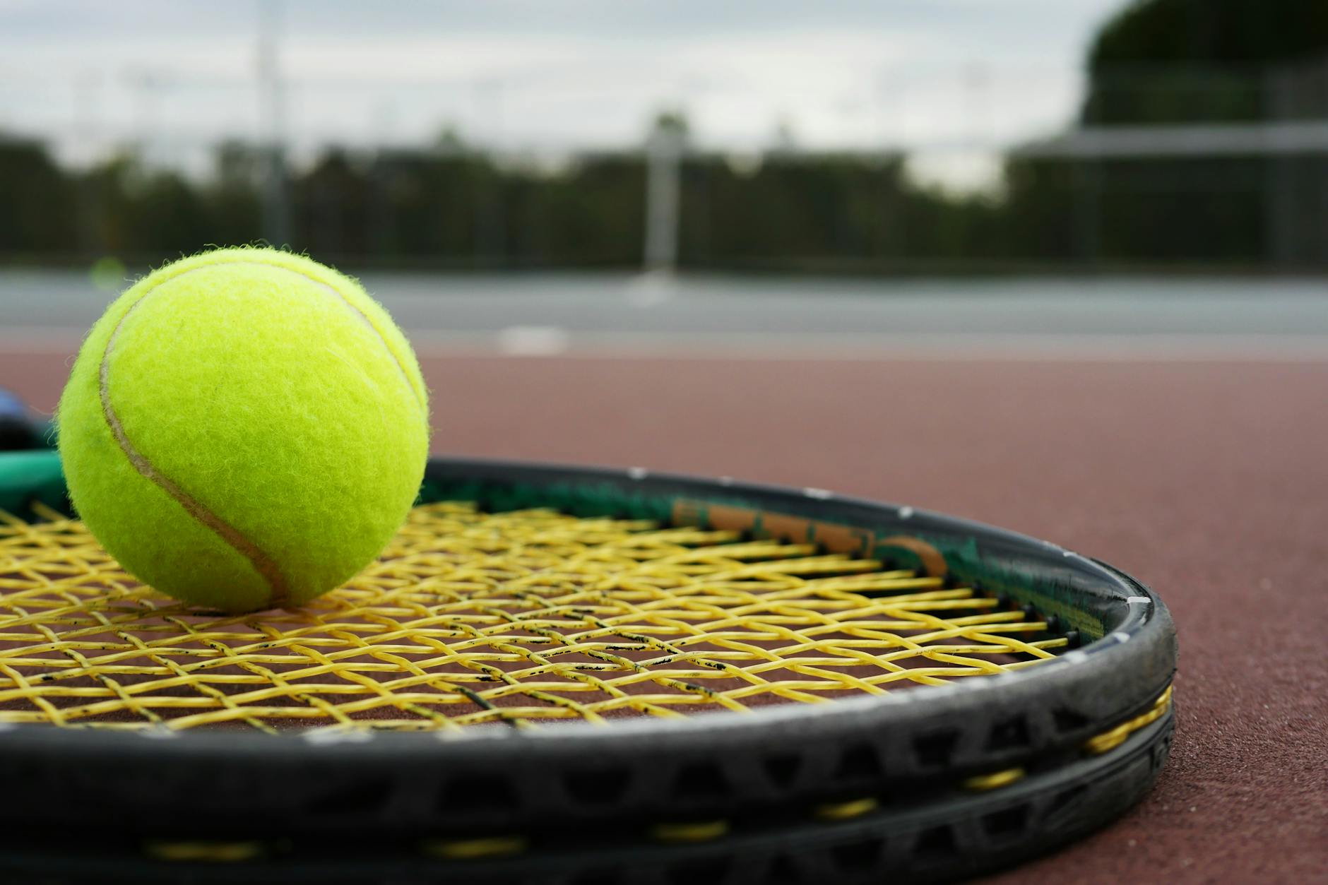 Green Tennis Ball on Tennis Court · Free Stock Photo