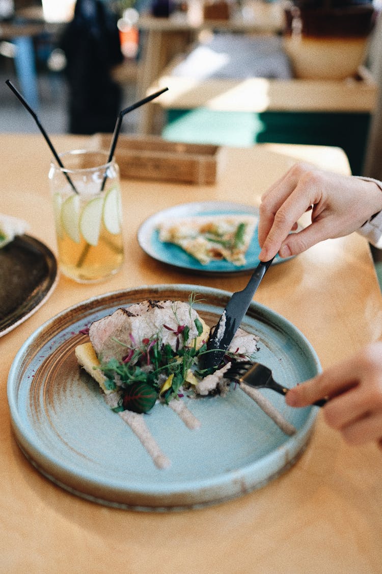 Crop Person Eating Molecular Dish In Modern Restaurant