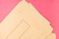 Brown Air Mail Envelopes on Pink Surface