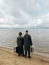 Man and Woman Standing on Beach