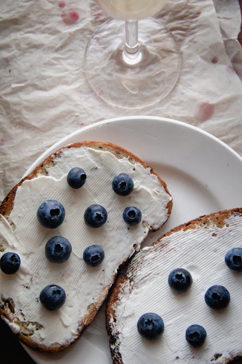 Blueberries on Toasted Bread with White Cream