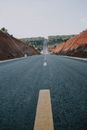 Gray Concrete Road Between Brown Mountains