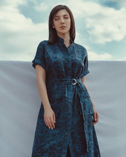 Beautiful woman with heterochromia in dress