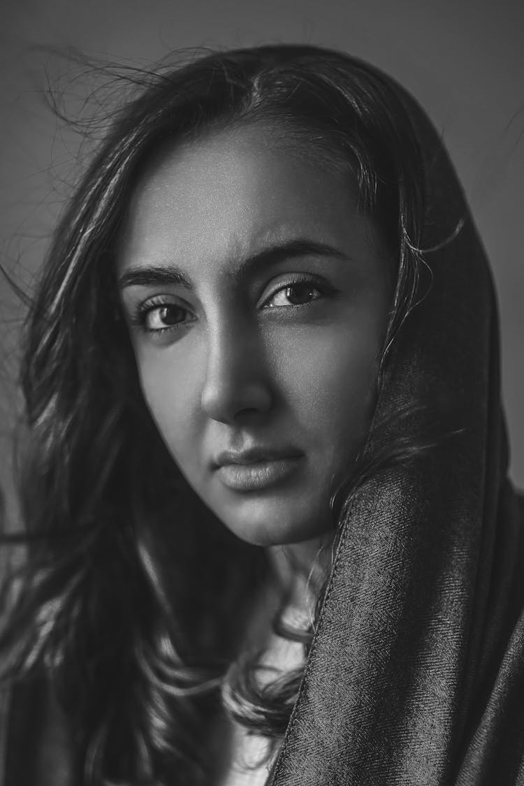 Sad Young Woman In Headscarf