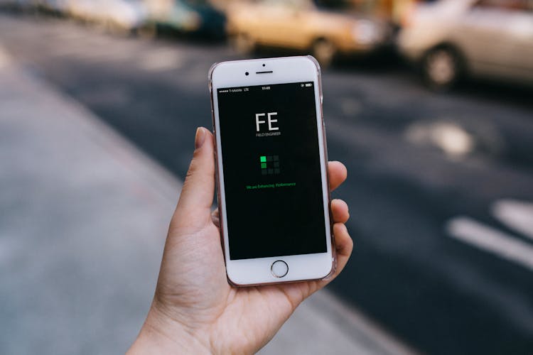 Person Holding Silver Iphone 6