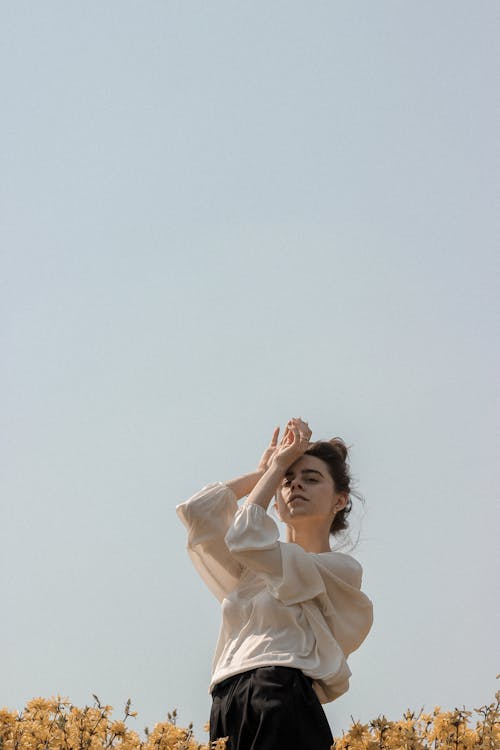 Woman in White Long Sleeve Shirt