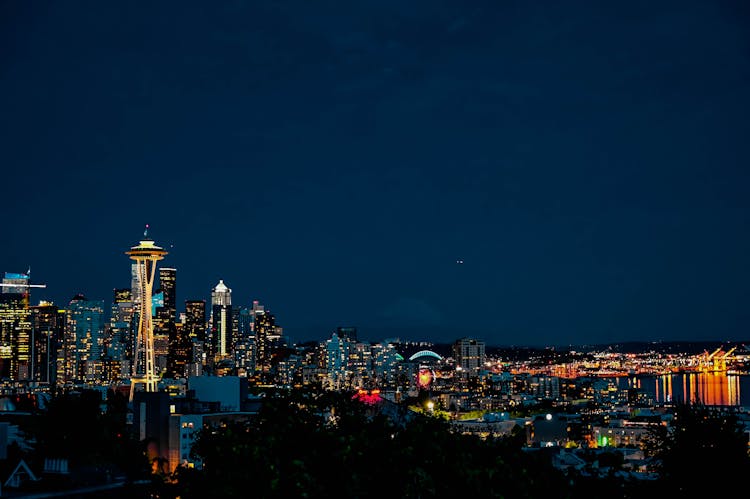 City Skyline Of City Building In Seattle Washington At Night