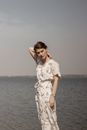 Woman Posing Near The Ocean
