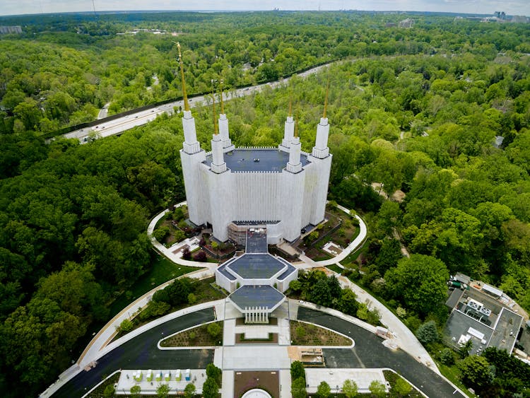 Drone View Of Majestic Temple Amidst Lush Park