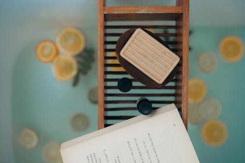 White Book Page on Brown Wooden Table