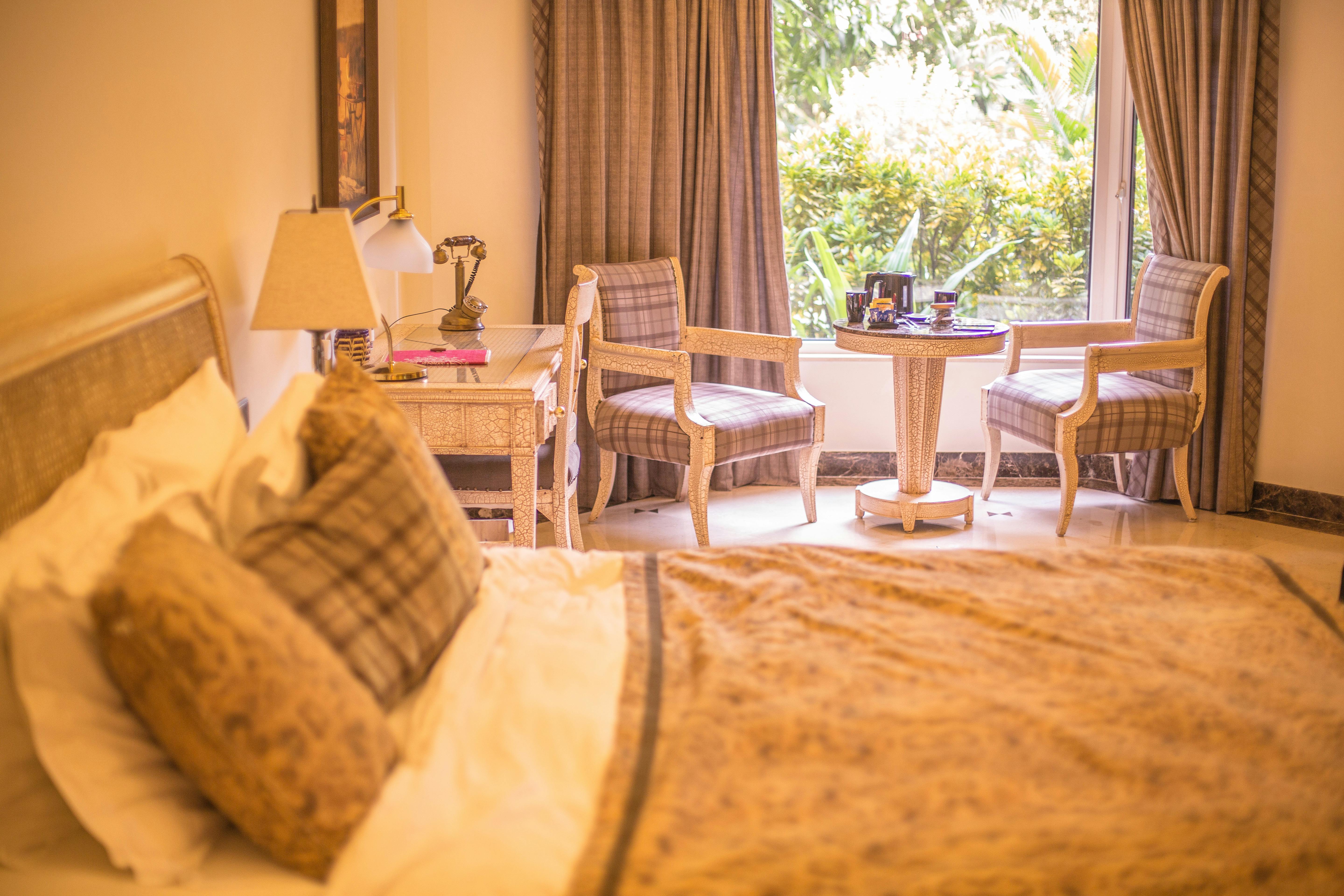 vanity table in bedroom alcove with natural light - dressing table folding mirror